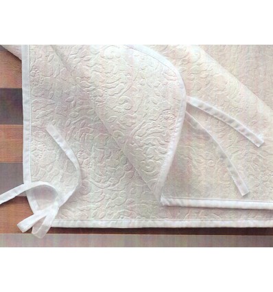 Couvre-sommier thermo-compact pour matelas à lacets